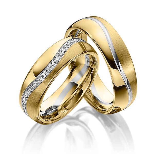 Set Bicolor Memoire-trouwringen in geelgoud 14 kt. witgoud 14 kt. volledig gezet met in totaal 0,48 ct. Briljant tw/si van Steinberg