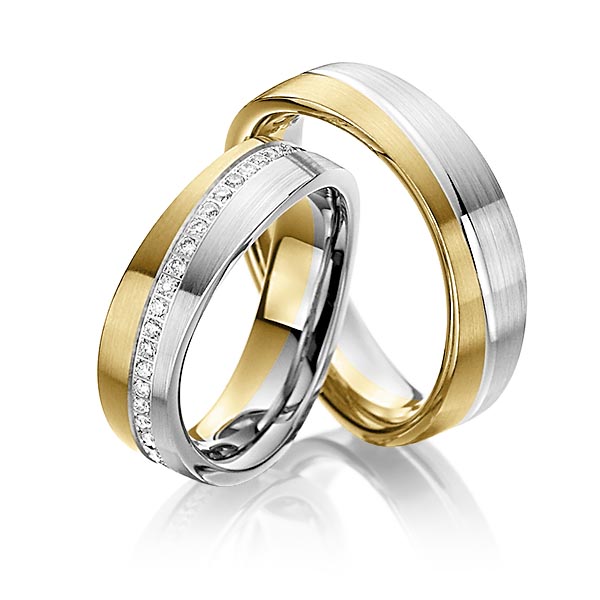 Set Bicolor Memoire-trouwringen in geelgoud 14 kt. witgoud 14 kt. volledig gezet met in totaal 0,48 ct. Briljant tw/si van Steinberg