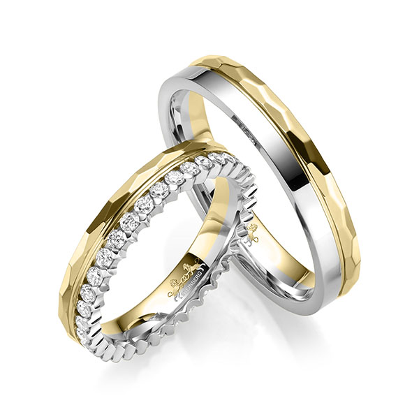 Set Bicolor Memoire-trouwringen in geelgoud 14 kt. witgoud 14 kt. volledig gezet met in totaal 0,68 ct. Briljant tw/si van Steinberg