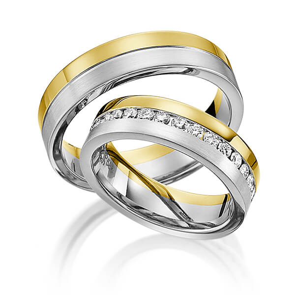 Set Bicolor Memoire-trouwringen in geelgoud 14 kt. witgoud 14 kt. volledig gezet met in totaal 0,99 ct. Briljant tw/si van Steinberg - Q-1194-4 Set Bicolor Memoire-trouwringen in geelgoud 14 kt. witgoud 14 kt. volledig gezet met in totaal 0,99 ct. Briljant tw/si van Steinberg - Q-1194-4