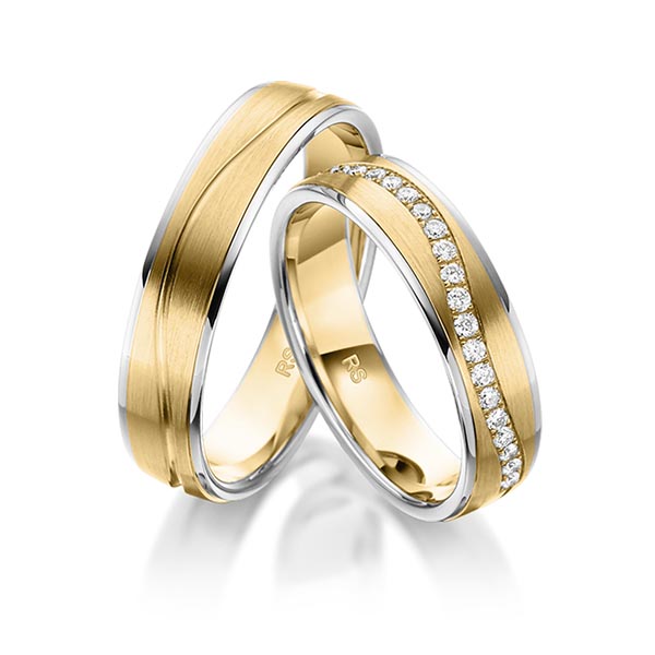 Set Bicolor Memoire-trouwringen in grijsgoud 14 kt. geelgoud 14 kt. half gezet met in totaal 0,22 ct. Briljant tw/si van acredo