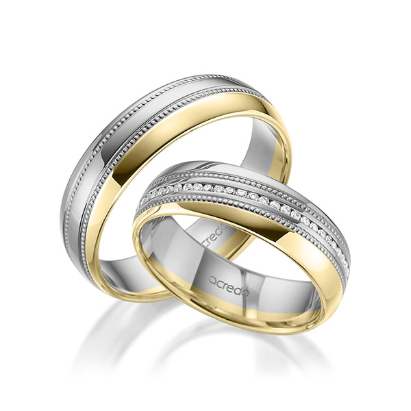 Set Bicolor Memoire-trouwringen in grijsgoud 14 kt. geelgoud 14 kt. volledig gezet met in totaal 0,28 ct. Briljant tw/si van acredo