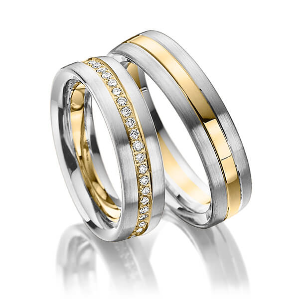 Set Bicolor Memoire-trouwringen in grijsgoud 14 kt. geelgoud 14 kt. volledig gezet met in totaal 0,48 ct. Briljant tw/si van Steinberg