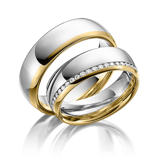 Set Bicolor Memoire-trouwringen in grijsgoud 14 kt. geelgoud 14 kt. volledig gezet met in totaal 0,48 ct. Briljant tw/si van Steinberg