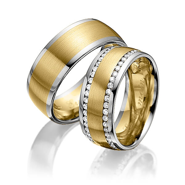 Set Bicolor Memoire-trouwringen in grijsgoud 14 kt. geelgoud 14 kt. volledig gezet met in totaal 0,94 ct. Briljant tw/si van Steinberg