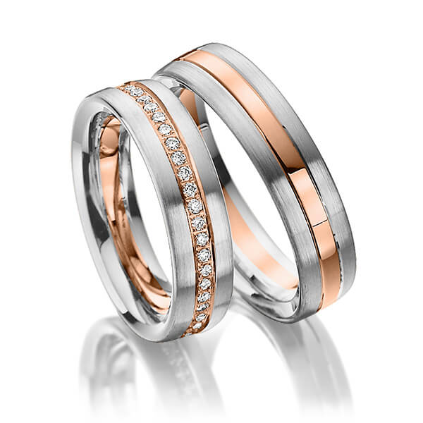 Set Bicolor Memoire-trouwringen in grijsgoud 14 kt. roodgoud 14 kt. volledig gezet met in totaal 0,48 ct. Briljant tw/si van Steinberg