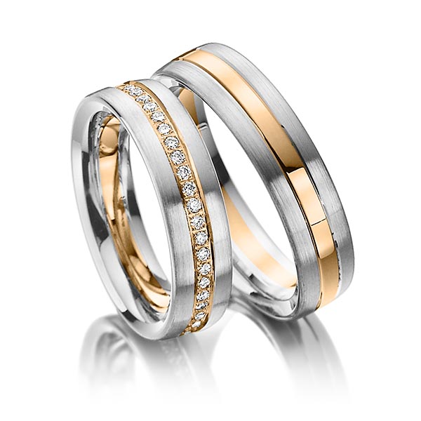 Set Bicolor Memoire-trouwringen in grijsgoud 14 kt. roségoud 14 kt. volledig gezet met in totaal 0,48 ct. Briljant tw/si van Steinberg