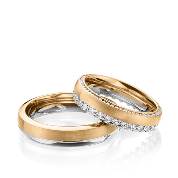 Set Bicolor Memoire-trouwringen in grijsgoud 14 kt. roségoud 14 kt. volledig gezet met in totaal 1,265 ct. Briljant tw/si van Steinberg