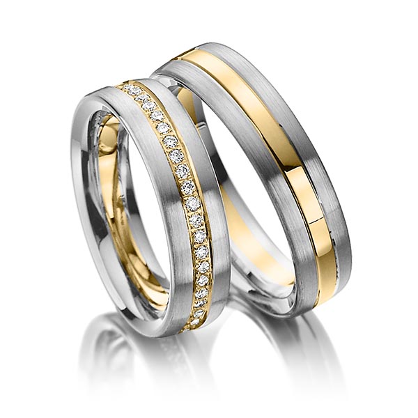 Set Bicolor Memoire-trouwringen in palladium 14 kt. geelgoud 14 kt. volledig gezet met in totaal 0,48 ct. Briljant tw/si van Steinberg