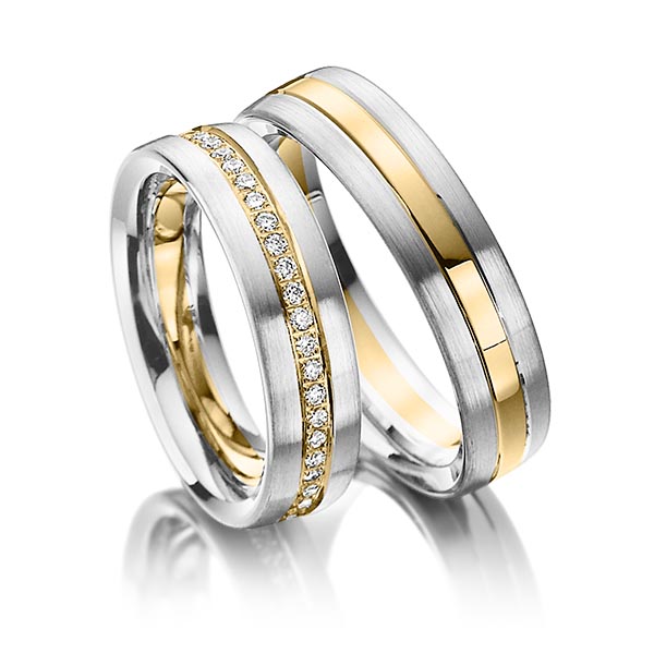 Set Bicolor Memoire-trouwringen in palladium 950 geelgoud 18 kt. volledig gezet met in totaal 0,48 ct. Briljant tw/si van Steinberg