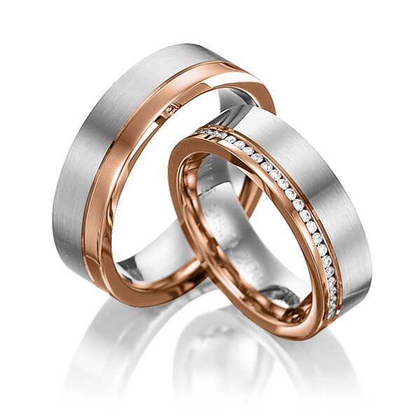 Set Bicolor Memoire-trouwringen in roodgoud 14 kt. witgoud 14 kt. volledig gezet met in totaal 0,384 ct. Briljant tw/si van Eternal Touch