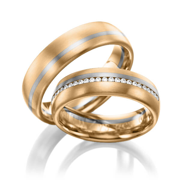 Set Bicolor Memoire-trouwringen in roségoud 14 kt. witgoud 14 kt. volledig gezet met in totaal 0,384 ct. Briljant tw/si van Eternal Touch