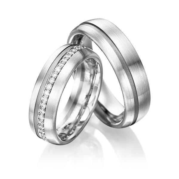 Set Bicolor Memoire-trouwringen in witgoud 14 kt. dark grey gold 14 kt. half gezet met in totaal 0,176 ct. Briljant tw/si van Steinberg - Q-1199-13 Set Bicolor Memoire-trouwringen in witgoud 14 kt. dark grey gold 14 kt. half gezet met in totaal 0,176 ct. Briljant tw/si van Steinberg - Q-1199-13