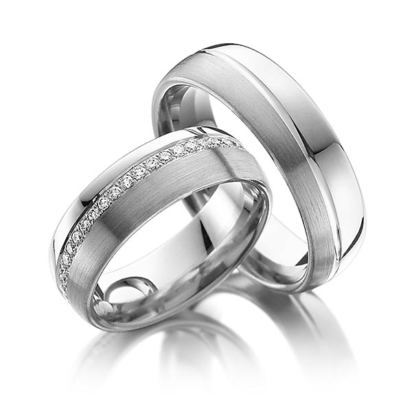 Set Bicolor Memoire-trouwringen in witgoud 14 kt. dark grey gold 14 kt. volledig gezet met in totaal 0,43 ct. Briljant tw/si van Steinberg