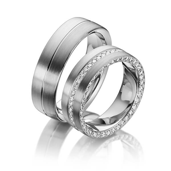 Set Bicolor Memoire-trouwringen in witgoud 14 kt. dark grey gold 14 kt. volledig gezet met in totaal 0,87 ct. Briljant tw/si van Steinberg