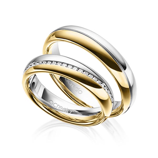 Set Bicolor Memoire-trouwringen in witgoud 14 kt. geelgoud 14 kt. half gezet met in totaal 0,2 ct. Briljant tw/si van acredo
