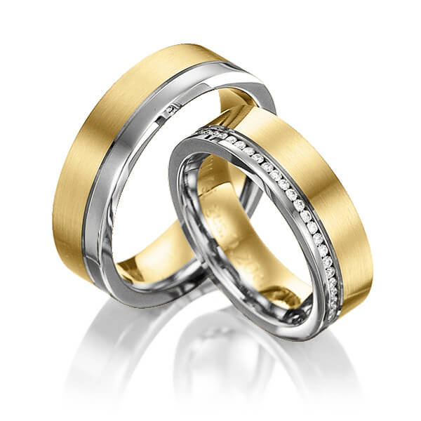 Set Bicolor Memoire-trouwringen in witgoud 14 kt. geelgoud 14 kt. volledig gezet met in totaal 0,384 ct. Briljant tw/si van Eternal Touch