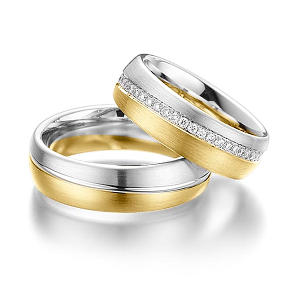 Set Bicolor Memoire-trouwringen in witgoud 14 kt. geelgoud 14 kt. volledig gezet met in totaal 0,45 ct. Briljant tw/si van Steinberg