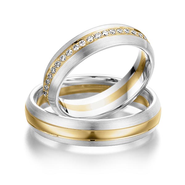 Set Bicolor Memoire-trouwringen in witgoud 14 kt. geelgoud 14 kt. volledig gezet met in totaal 0,46 ct. Briljant tw/si van Steinberg