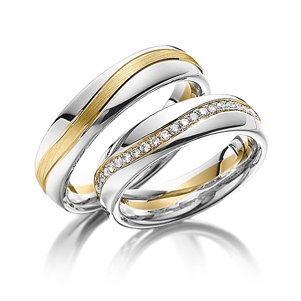 Set Bicolor Memoire-trouwringen in witgoud 14 kt. geelgoud 14 kt. volledig gezet met in totaal 0,48 ct. Briljant tw/si van Steinberg