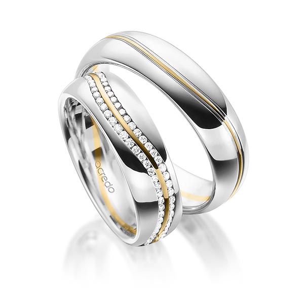 Set Bicolor Memoire-trouwringen in witgoud 14 kt. geelgoud 14 kt. volledig gezet met in totaal 0,59 ct. Briljant tw/si van acredo