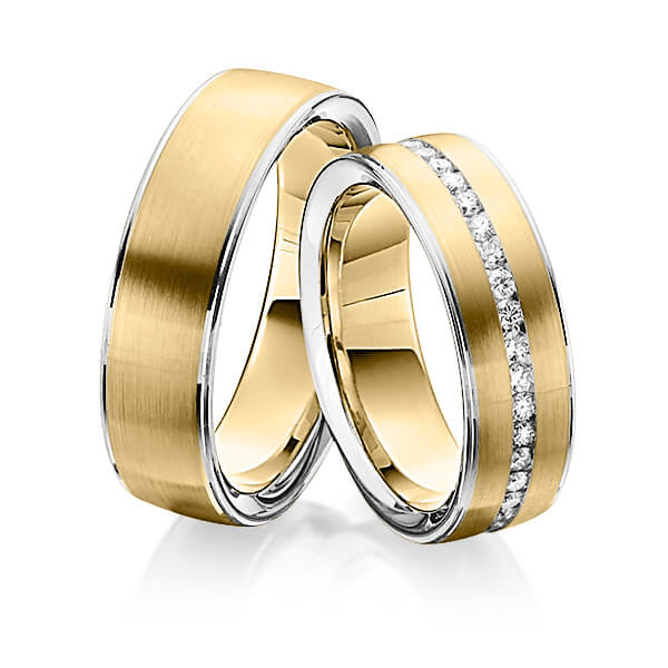 Set Bicolor Memoire-trouwringen in witgoud 14 kt. geelgoud 14 kt. volledig gezet met in totaal 0,74 ct. Briljant tw/si van Steinberg
