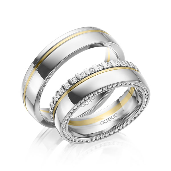 Set Bicolor Memoire-trouwringen in witgoud 14 kt. geelgoud 14 kt. volledig gezet met in totaal 0,75 ct. Briljant tw/si van acredo