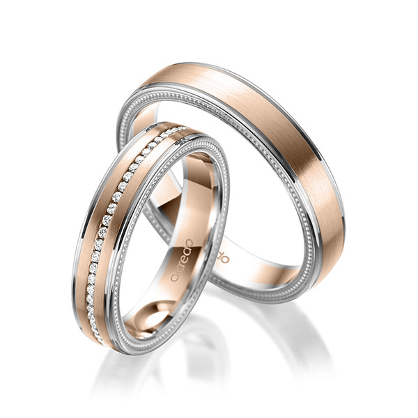 Set Bicolor Memoire-trouwringen in witgoud 14 kt. roodgoud 14 kt. volledig gezet met in totaal 0,295 ct. Briljant tw/si van acredo - A-1763-3 Set Bicolor Memoire-trouwringen in witgoud 14 kt. roodgoud 14 kt. volledig gezet met in totaal 0,295 ct. Briljant tw/si van acredo - A-1763-3