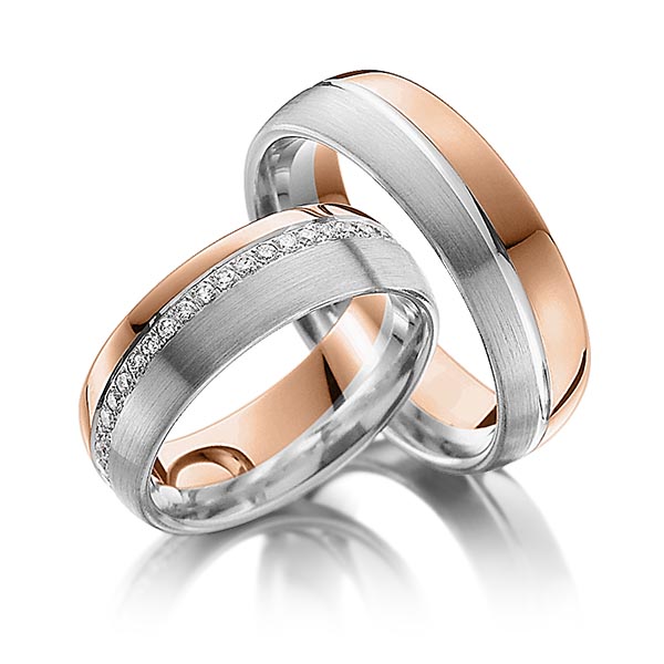 Set Bicolor Memoire-trouwringen in witgoud 14 kt. roodgoud 14 kt. volledig gezet met in totaal 0,43 ct. Briljant tw/si van Steinberg