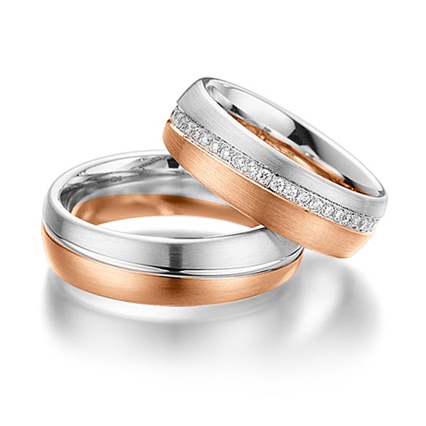 Set Bicolor Memoire-trouwringen in witgoud 14 kt. roodgoud 14 kt. volledig gezet met in totaal 0,45 ct. Briljant tw/si van Steinberg