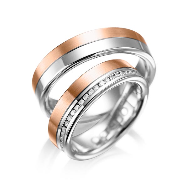 Set Bicolor Memoire-trouwringen in witgoud 14 kt. roodgoud 14 kt. volledig gezet met in totaal 0,46 ct. Briljant tw/si van acredo