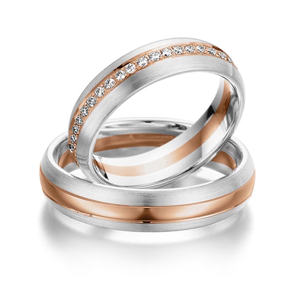 Set Bicolor Memoire-trouwringen in witgoud 14 kt. roodgoud 14 kt. volledig gezet met in totaal 0,46 ct. Briljant tw/si van Steinberg