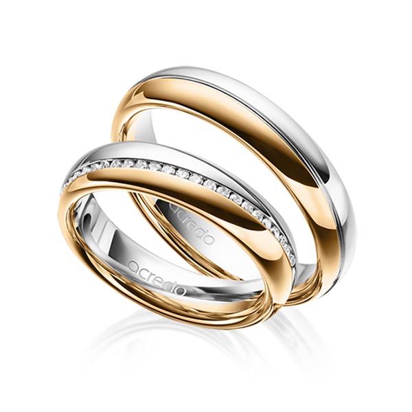Set Bicolor Memoire-trouwringen in witgoud 14 kt. roségoud 14 kt. half gezet met in totaal 0,2 ct. Briljant tw/si van acredo