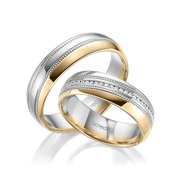 Set Bicolor Memoire-trouwringen in witgoud 14 kt. roségoud 14 kt. volledig gezet met in totaal 0,28 ct. Briljant tw/si van acredo