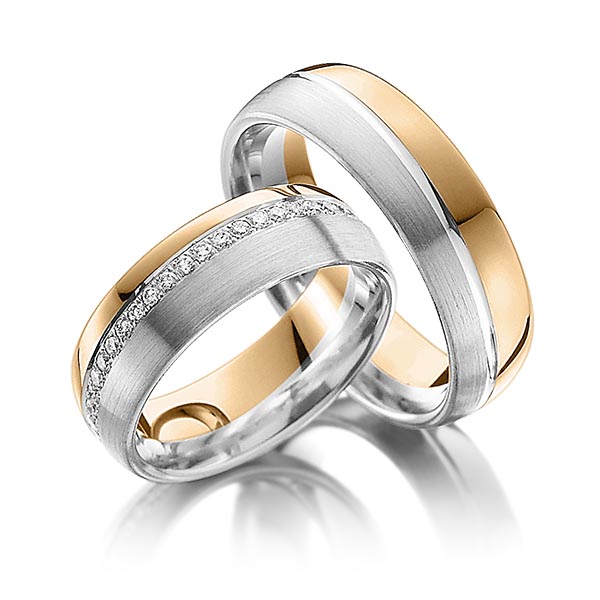 Set Bicolor Memoire-trouwringen in witgoud 14 kt. roségoud 14 kt. volledig gezet met in totaal 0,43 ct. Briljant tw/si van Steinberg