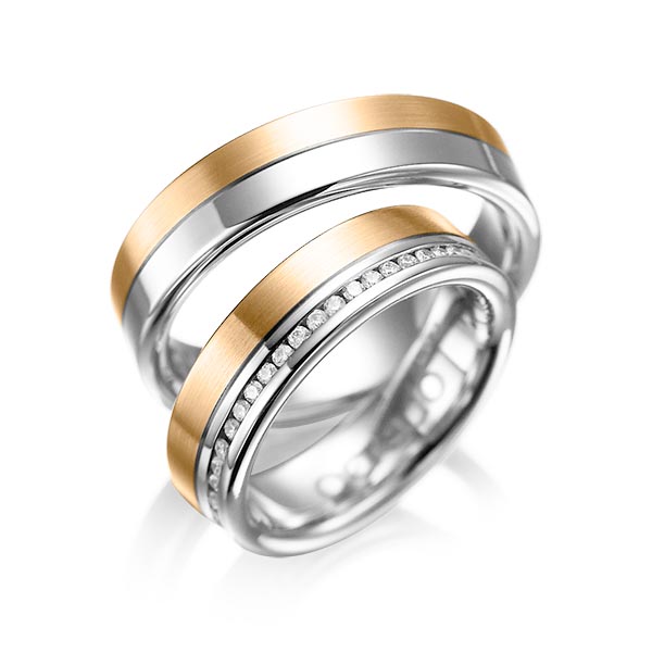 Set Bicolor Memoire-trouwringen in witgoud 14 kt. roségoud 14 kt. volledig gezet met in totaal 0,46 ct. Briljant tw/si van acredo
