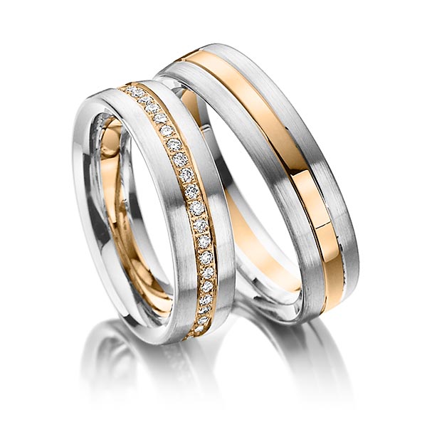 Set Bicolor Memoire-trouwringen in witgoud 14 kt. roségoud 14 kt. volledig gezet met in totaal 0,48 ct. Briljant tw/si van Steinberg