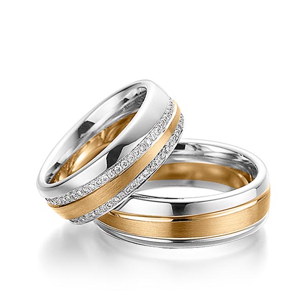 Set Bicolor Memoire-trouwringen in witgoud 14 kt. roségoud 14 kt. volledig gezet met in totaal 0,61 ct. Briljant tw/si van Steinberg
