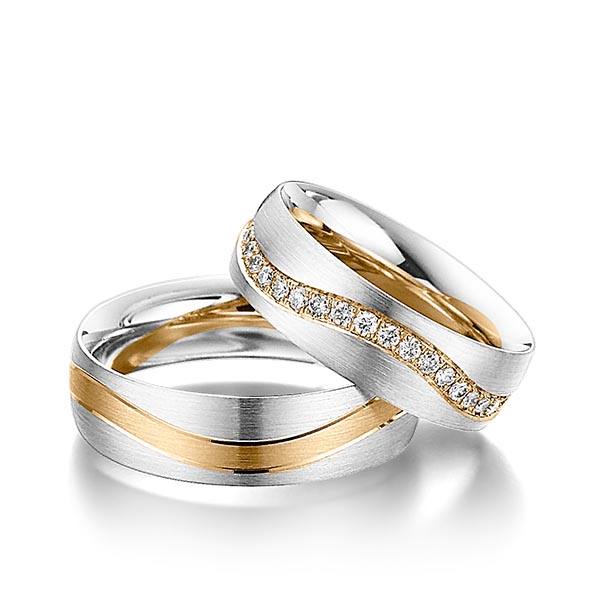 Set Bicolor Memoire-trouwringen in witgoud 14 kt. roségoud 14 kt. volledig gezet met in totaal 0,68 ct. Briljant tw/si van Steinberg