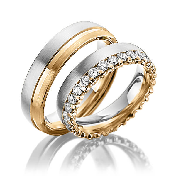 Set Bicolor Memoire-trouwringen in witgoud 14 kt. roségoud 14 kt. volledig gezet met in totaal 1,3 ct. Briljant tw/si van Steinberg