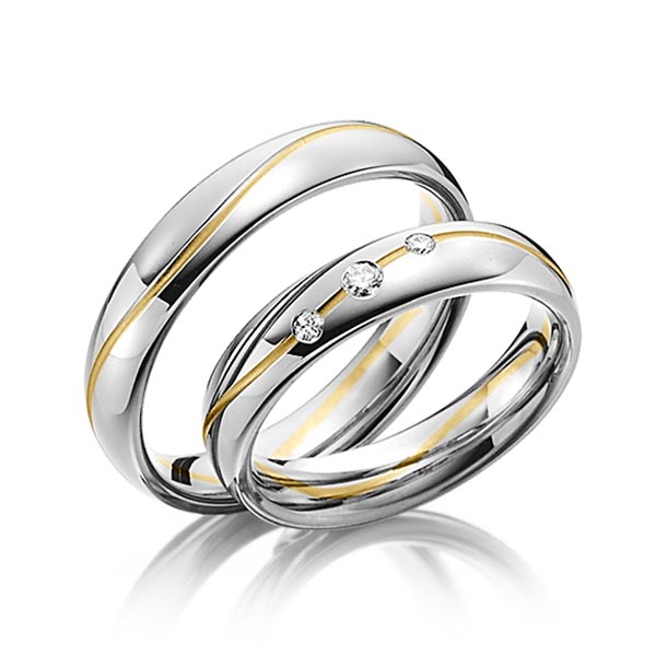 Set Bicolor trouwringen in 600 Platinahoudend metaal (60%) geelgoud 14 kt. met in totaal 0,08 ct. Briljant tw/si van Steinberg