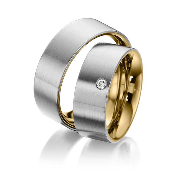 Set Bicolor trouwringen in buiten dark grey gold 14 kt. , binnen geelgoud 14 kt. met in totaal 0,05 ct. Briljant tw/si van Eternal Touch