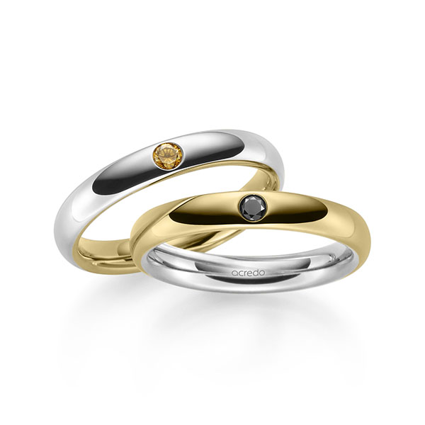 Set Bicolor trouwringen in buiten geelgoud 14 kt. , binnen grijsgoud 14 kt. met in totaal 0,06 ct. Briljant Zwart van acredo