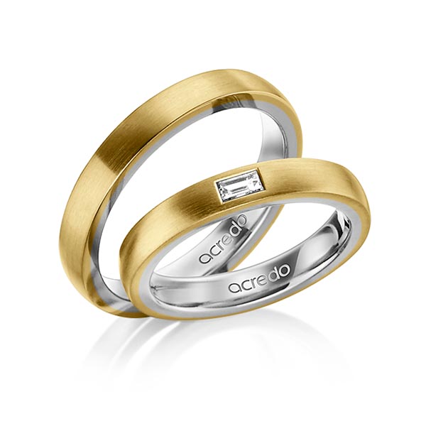 Set Bicolor trouwringen in buiten geelgoud 14 kt. , binnen grijsgoud 14 kt. met in totaal 0,15 ct. Baguette-Diamant tw,vs van acredo