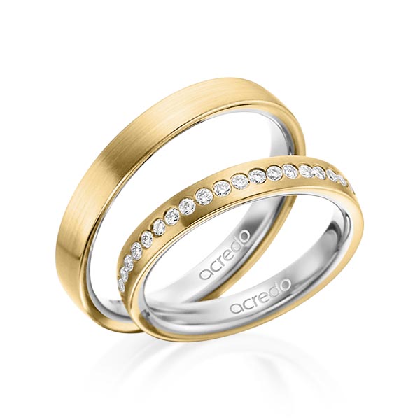 Set Bicolor trouwringen in buiten geelgoud 14 kt. , binnen grijsgoud 14 kt. met in totaal 0,225 ct. Briljant tw/si van acredo