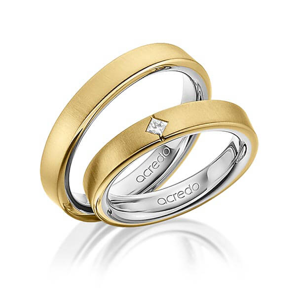 Set Bicolor trouwringen in buiten geelgoud 18 kt. , binnen platina 950 met in totaal 0,05 ct. Princess-Diamant tw/si van acredo