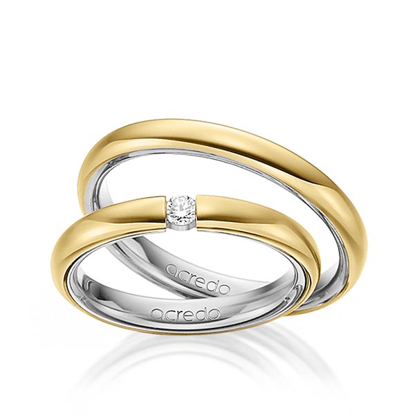 Set Bicolor trouwringen in buiten geelgoud 18 kt. , binnen platina 950 met in totaal 0,08 ct. Briljant tw/si van acredo