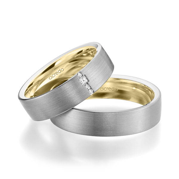 Set Bicolor trouwringen in buiten grijsgoud 14 kt. , binnen geelgoud 14 kt. met in totaal 0,045 ct. Briljant & Princess-Diamant tw/si van acredo