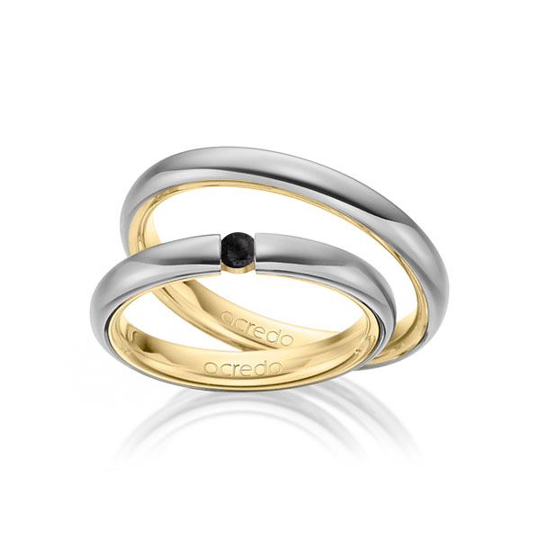 Set Bicolor trouwringen in buiten grijsgoud 14 kt. , binnen geelgoud 14 kt. met in totaal 0,08 ct. Briljant Zwart van acredo
