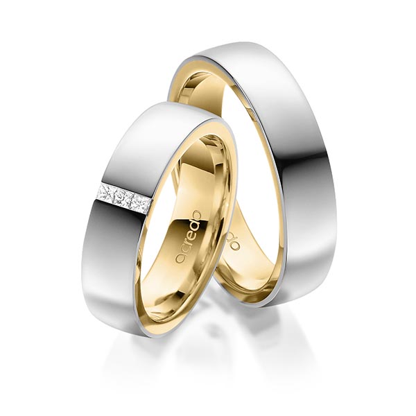 Set Bicolor trouwringen in buiten grijsgoud 14 kt. , binnen geelgoud 14 kt. met in totaal 0,09 ct. Princess-Diamant tw/si van acredo